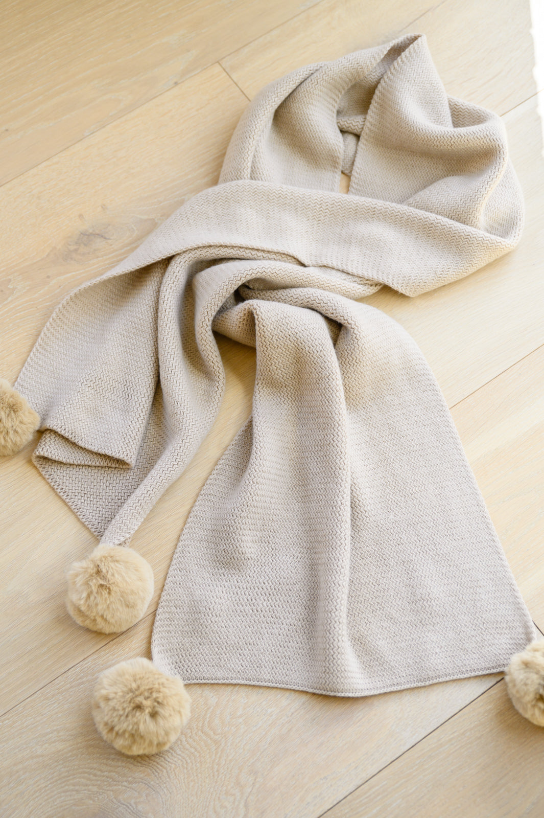 KnittedFuzzyPomPomScarfInBeige6